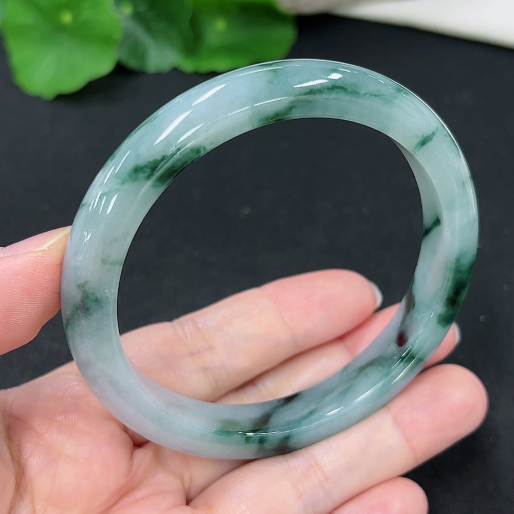 HKHQ Jadeite round bangle in size 59.5 with a weight of 47.4g, showcasing smooth, polished jadeite surface and elegant circular design.