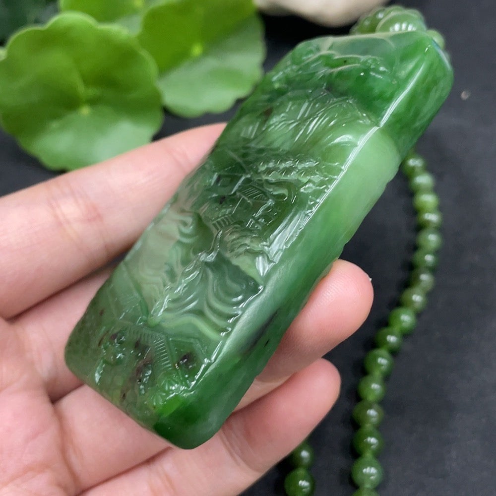 Huiliu HQ Hetian Jade Buddha pendant observing the world, intricately carved jade jewelry with detailed Buddha design.