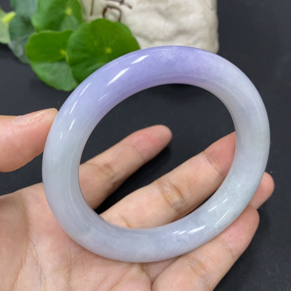 HKHQ jadeite round bangle in size 56.3 with a 77.3g weight, showcasing smooth, polished jadeite craftsmanship and elegant design.