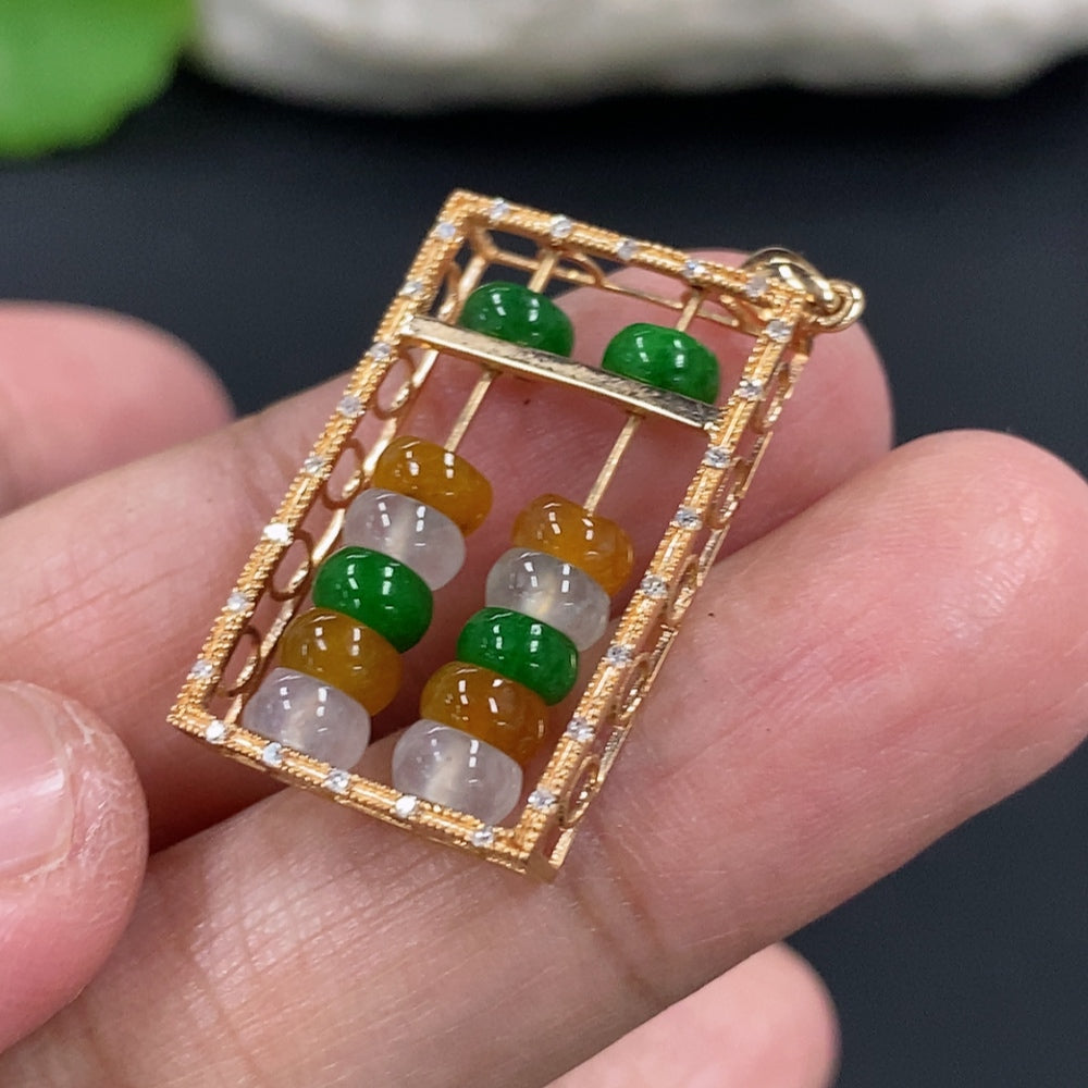 Jadeite pendant with 18K gold setting, accented with diamonds and mineral components, weighing approximately 3g.