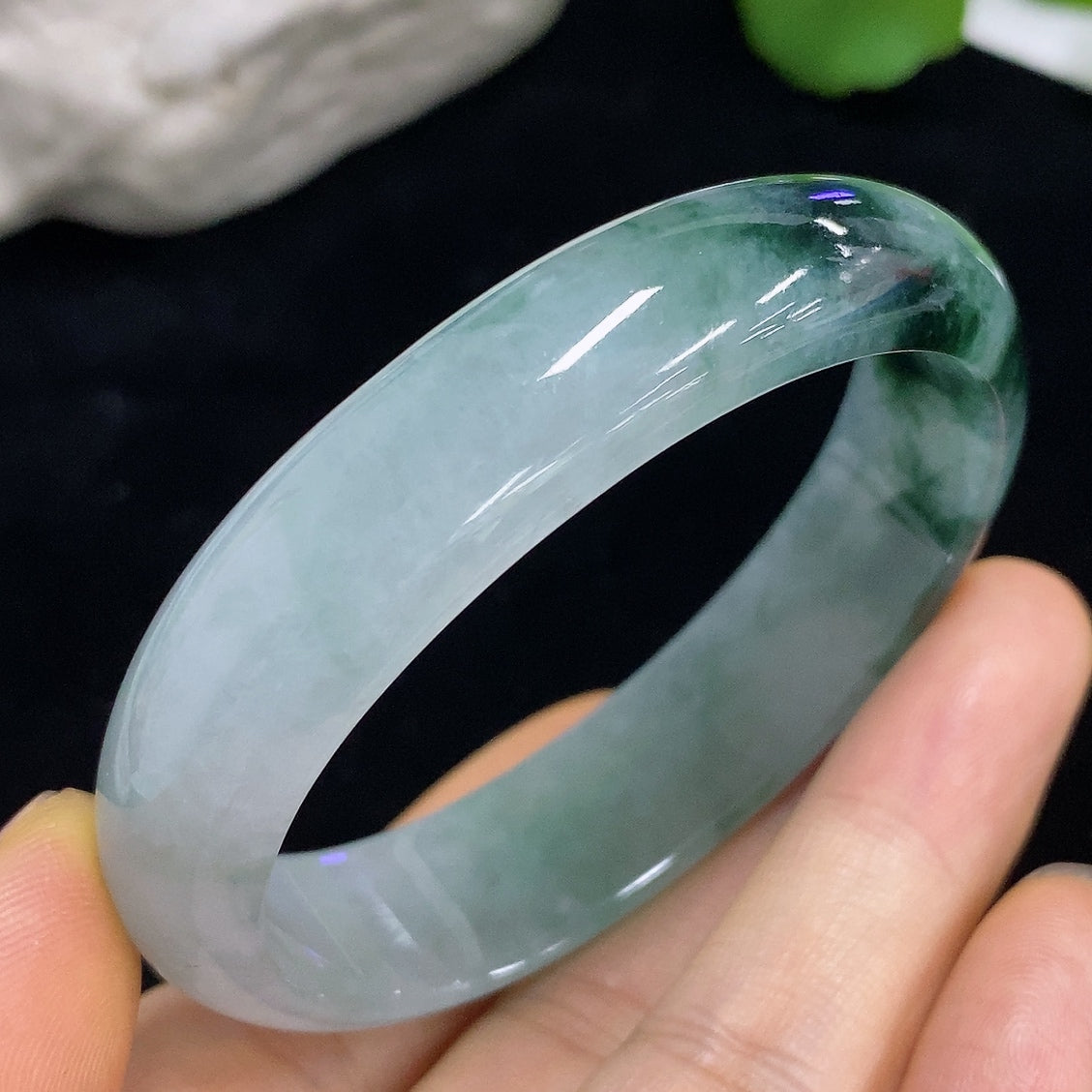 HKHQ jadeite concubine bracelet with intricate design, weighs 37.7g, size 53.8/45.6, showcasing smooth, polished jadeite beads.