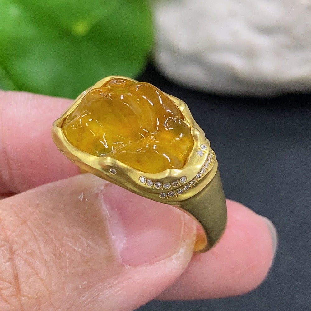Jadeite inlaid ring with 18k gold and diamond accents, size 16, weighing 8.5g, featuring a jade gemstone and intricate design.