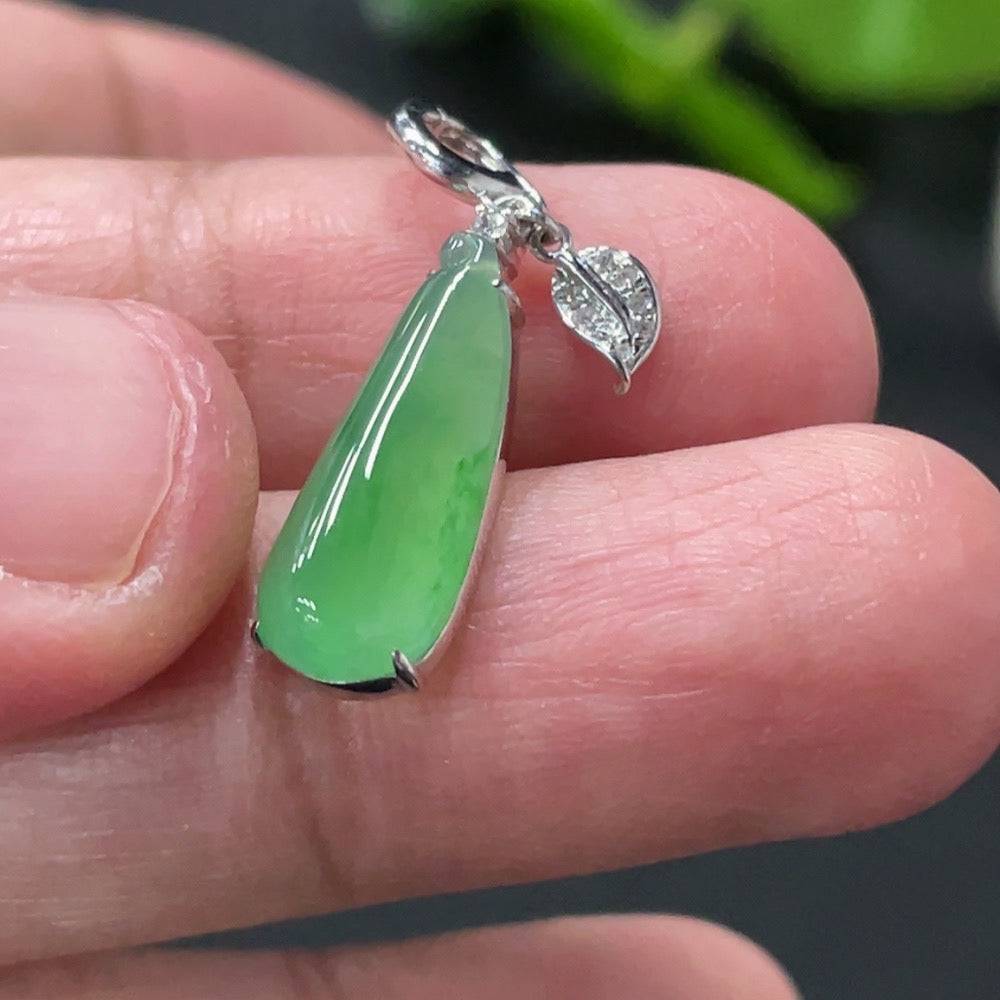 Huiliu Jadeite auspicious gourd pendant in a decorative setting, crafted from high-quality jade with intricate design details.