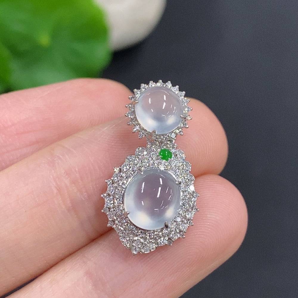 Jadeite bezel-set cabochon pendant with 18k gold and diamond accents, showcasing detailed craftsmanship and elegant design.
