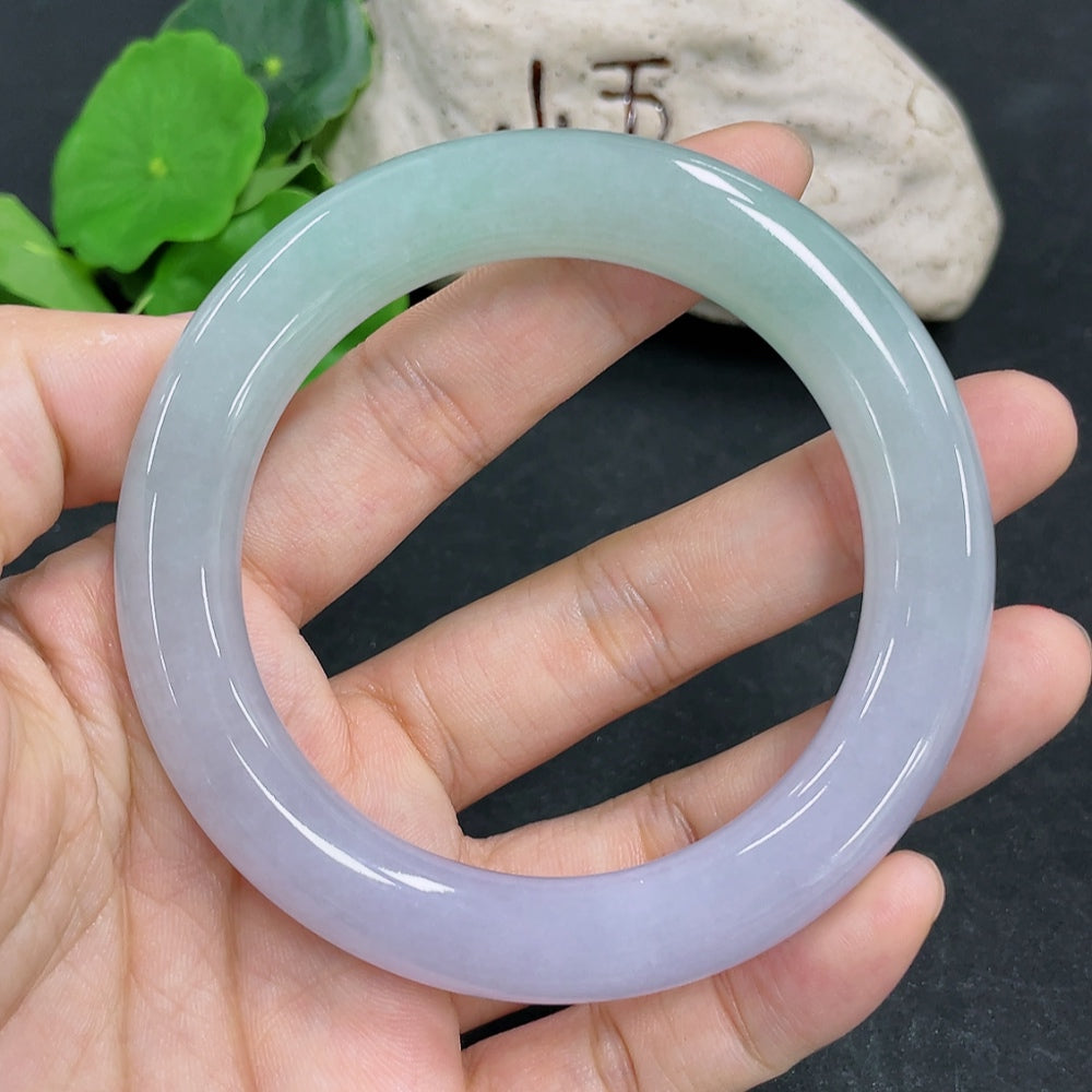 HKHQ jadeite round bangle in size 57.1 with a weight of 70.28g, showcasing smooth, polished jadeite craftsmanship.