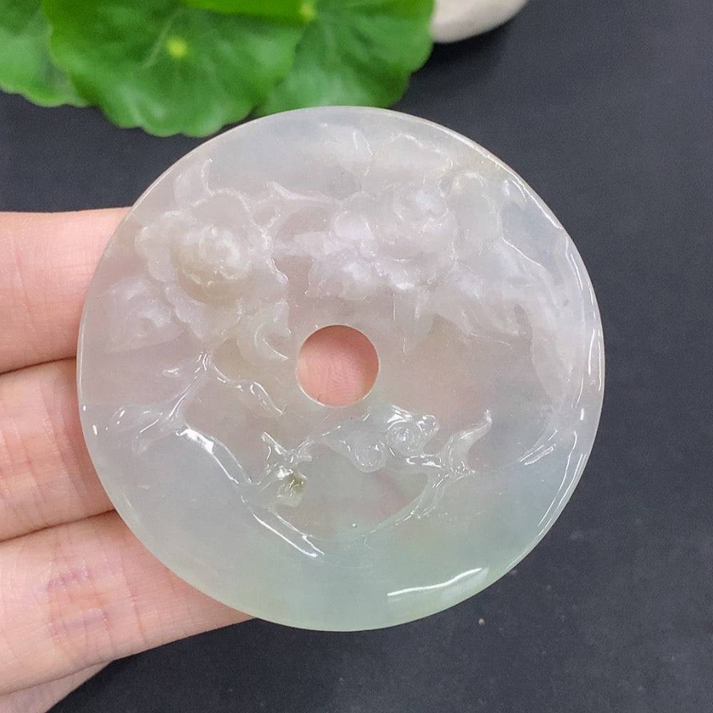 Huiliu Jadeite Flourishing Prosperity Pendant with intricate carving, showcasing vibrant green jade and detailed craftsmanship.