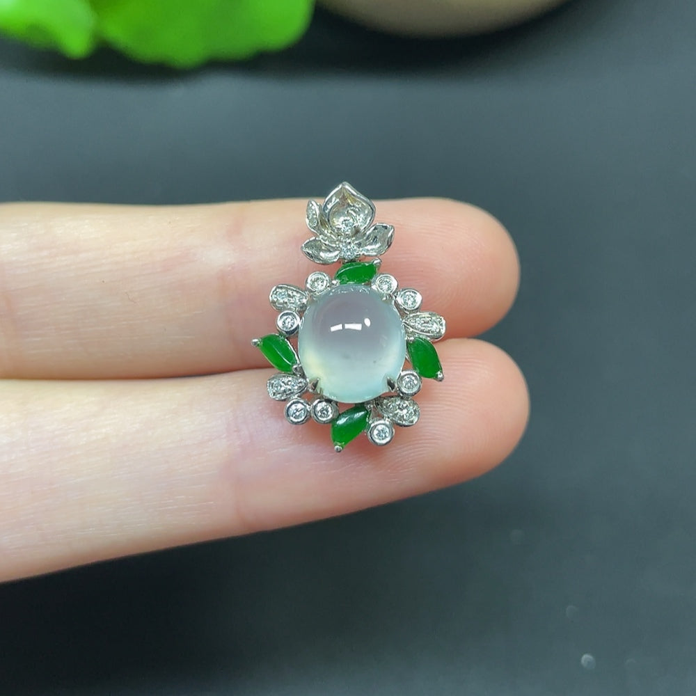 Jadeite cabochon pendant with diamond accents in 18K gold, elegant necklace showcasing a polished green gemstone.