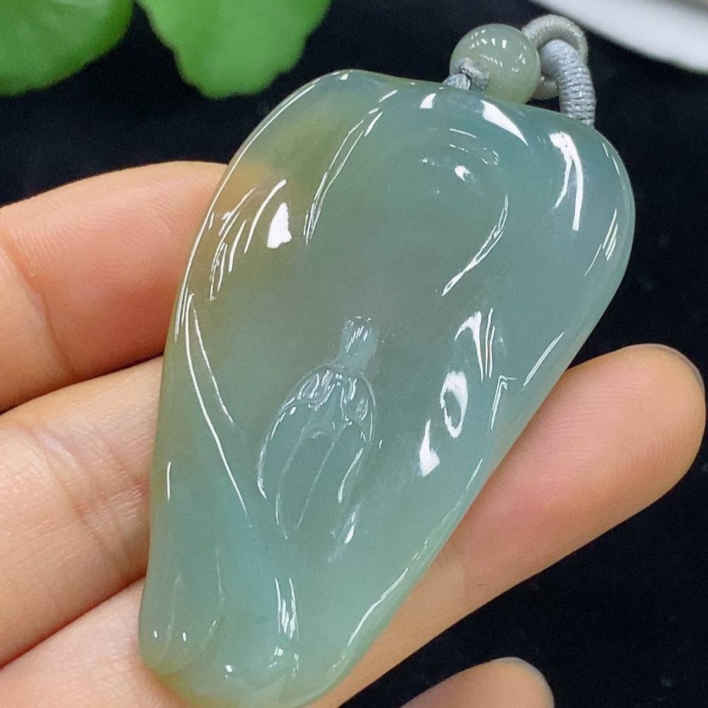 HUILIU HQ jadeite formless pendant showcasing smooth, polished green jade with natural variations and a sleek, elegant design.