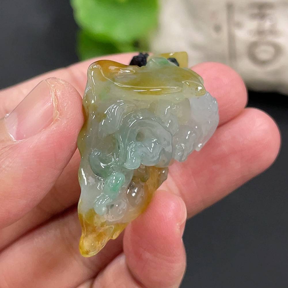 Jadeite dragon pendant from HUILIU HQ, featuring intricate dragon design, weighs approximately 16.38 grams, displayed on a plain background.