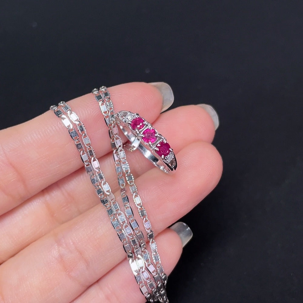 18k gold Ruby inlaid ring with diamond accents, size 13, featuring a detailed design and a total weight of 4.69g.