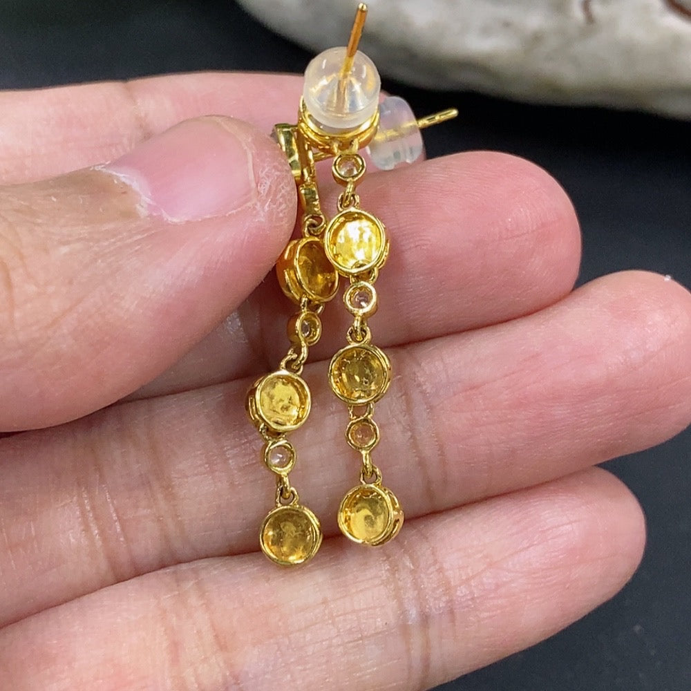 HKHQ jadeite cabochon earrings in 18K gold featuring smooth, rounded jade stones on elegant gold settings.