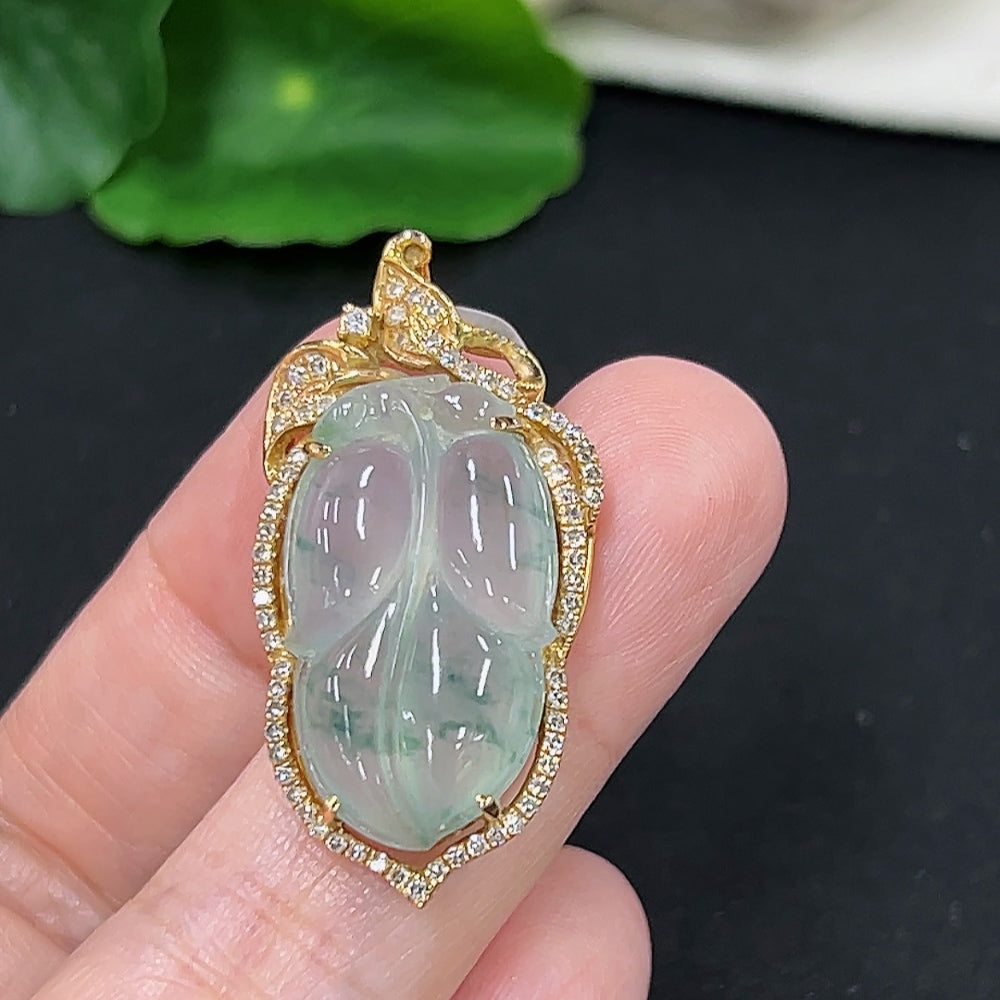Jadeite leaf inlay pendant with diamond accents in 18K gold, displayed on a white background. HKHQ jewelry piece.