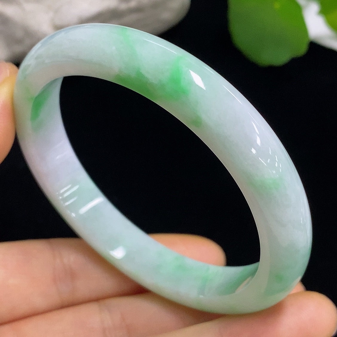 HKHQ Jadeite round bangle, size 57.3, showcasing smooth, polished green jade with a total weight of 43.82 grams.