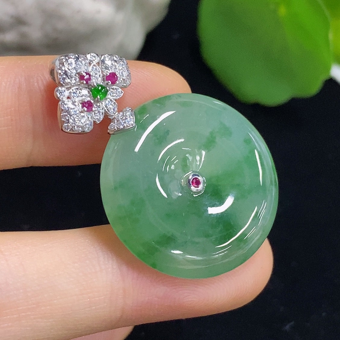 Jadeite Peace Knot pendant by HKHQ featuring an 18K non-diamond jade pendant with intricate design, displayed close-up.