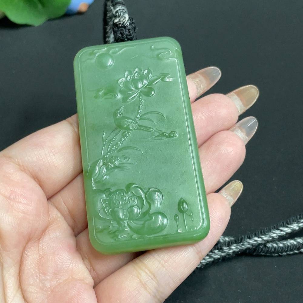 Huiliu HQ Hetian jade Guanyin pendant with rope, certified Huiliu, showcasing intricate carved design and smooth green jade surface.