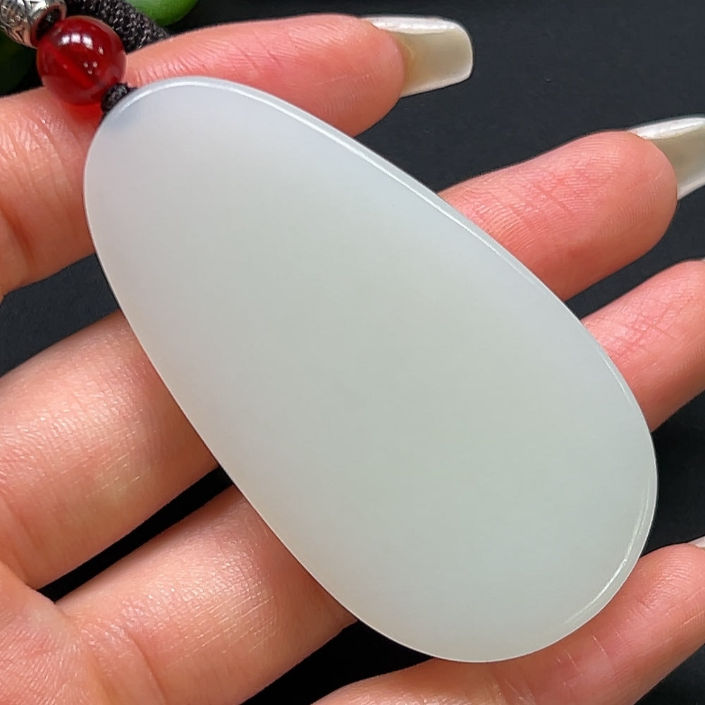 Hetian Jade plain pendant with rope necklace, crafted by HKHQ, weighing 43.84g, showcasing smooth jade and elegant design.
