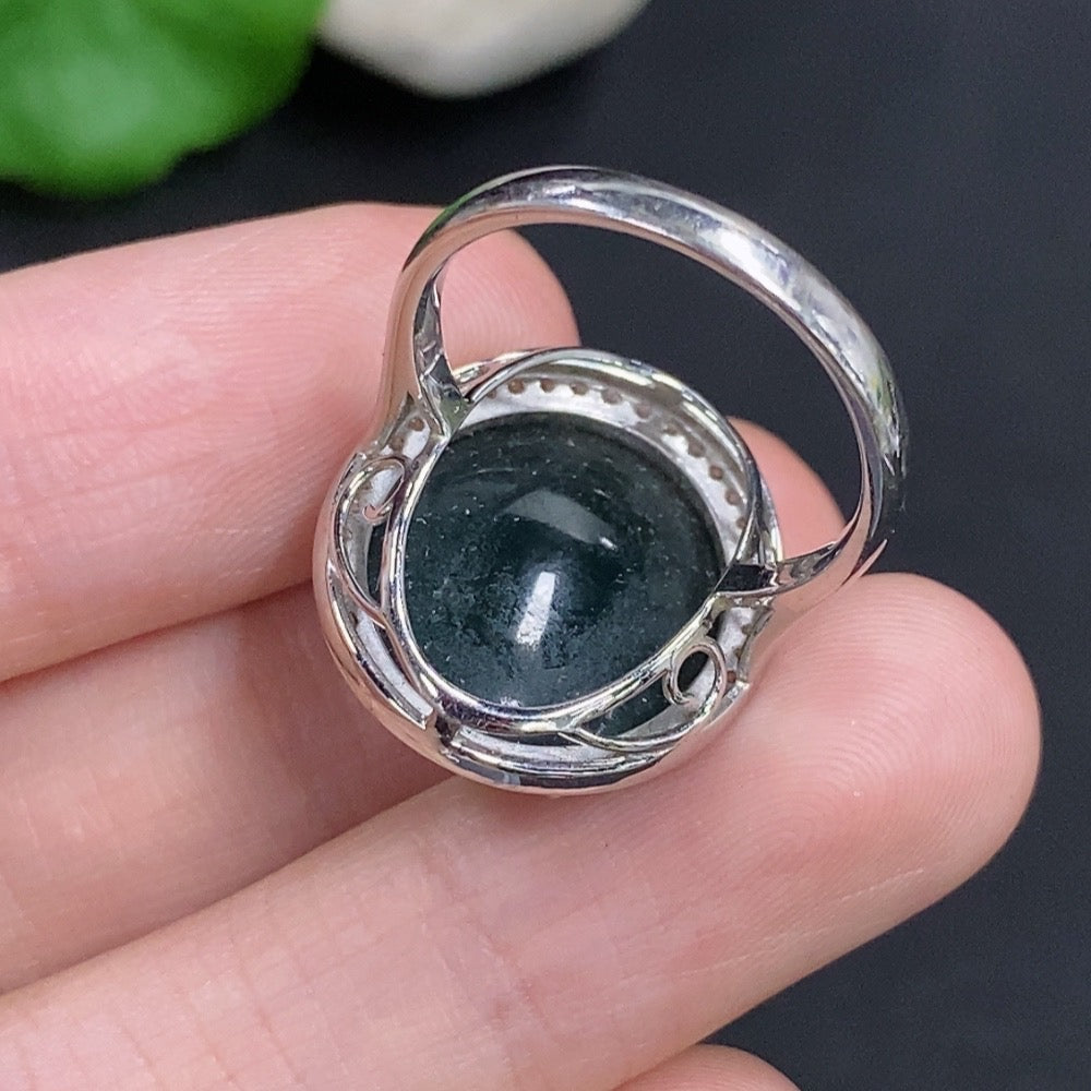 Jadeite cabochon ring with diamond accents in 18k gold, size 14, featuring a polished green jade stone and detailed gold band.