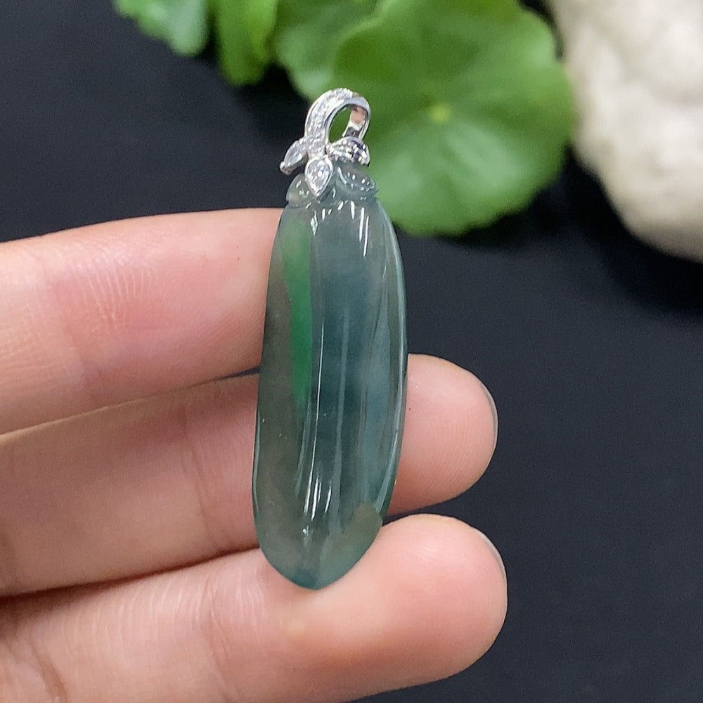 Huiliu Jadeite Blessing Melon Pendant with diamond accents, featuring a polished green jadeite jade and intricate craftsmanship.