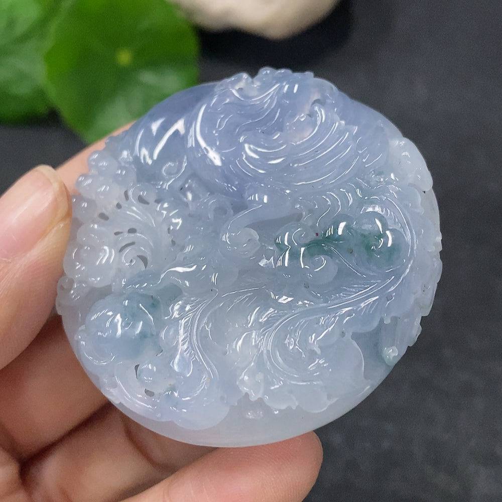 Jadeite Phoenix pendant from HUILIU HQ, crafted from green jade, weighing approximately 49.9g, featuring intricate phoenix design.