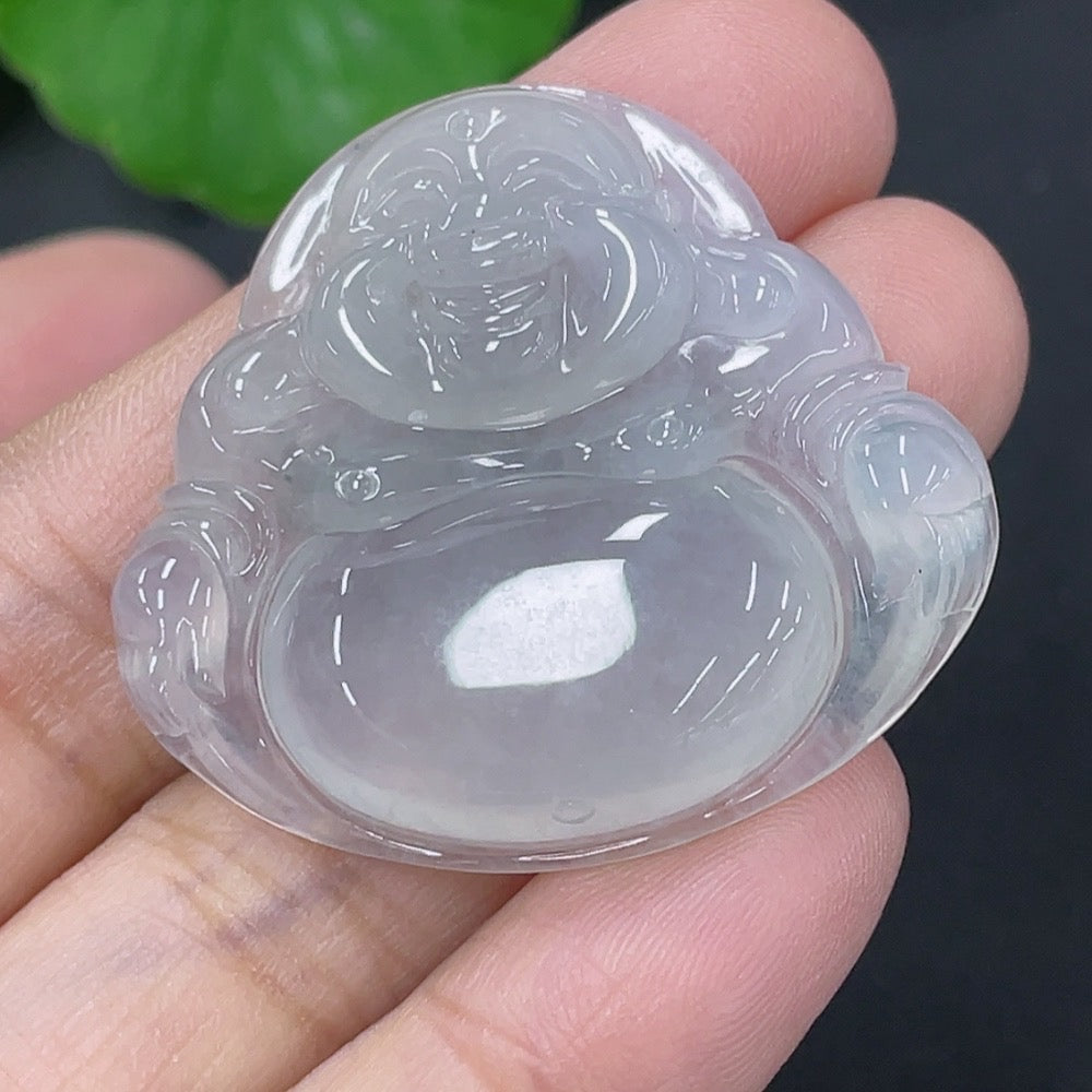 Huiliu Jadeite Buddha pendant showcasing a polished green jade carved Buddha figure on a cord necklace.