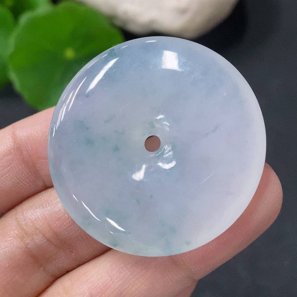Huiliu Jadeite pendant featuring a peace buckle design, crafted from high-quality jade, with certification details visible.