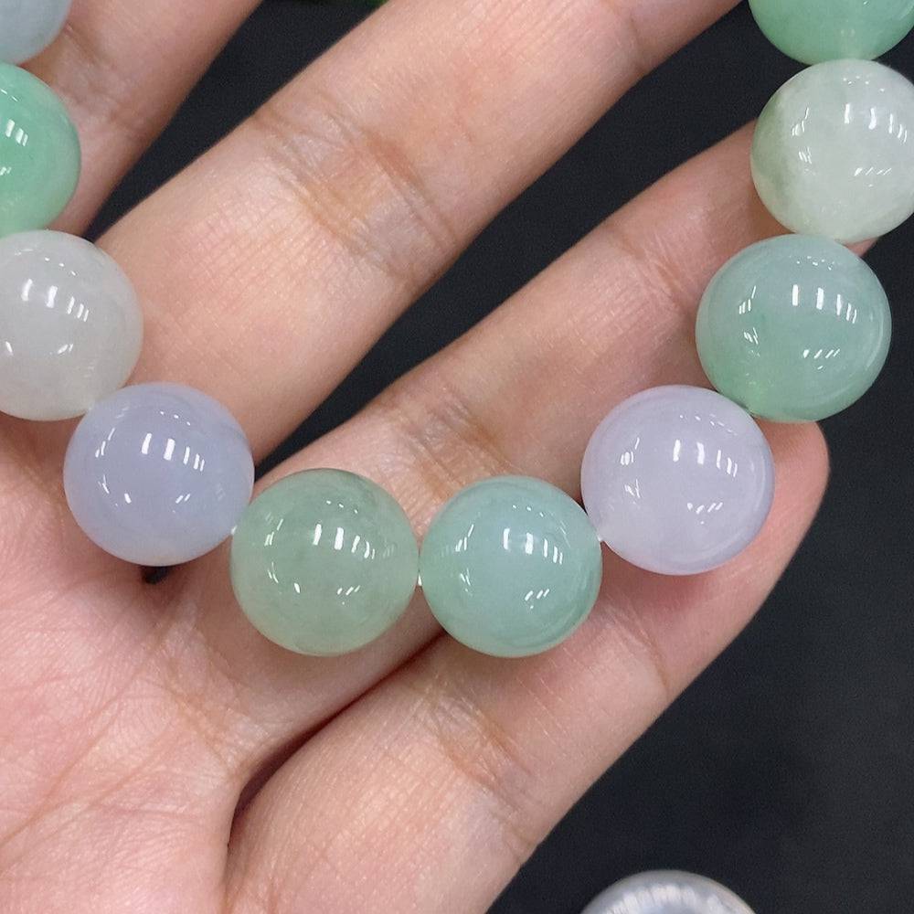 HUILIU HQ jadeite bead necklace with 12mm beads, approximately 54.5g, showcasing smooth, polished jadeite stones.