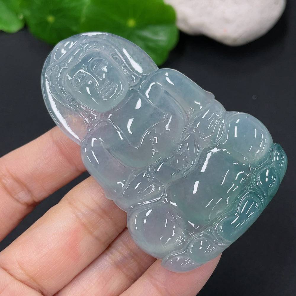 Jadeite Guanyin pendant from HUILIU HQ, intricately carved jade jewelry weighing approximately 27.26 grams.