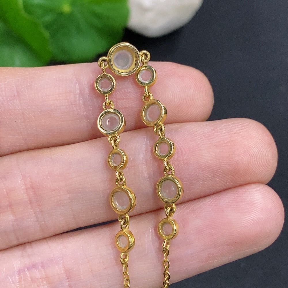 HKHQ jadeite cabochon inlay bracelet with 18k gold and diamond accents, showcasing a delicate, elegant jewelry piece.