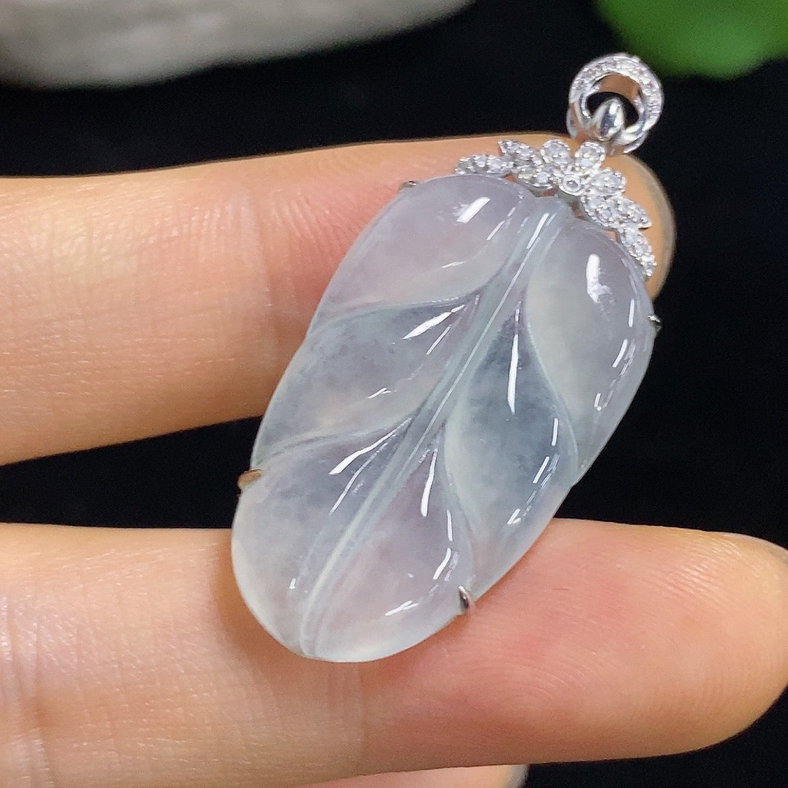 Jadeite leaf pendant necklace in 18k gold with diamond accent, weighing approximately 4.5g, by HKHQ.