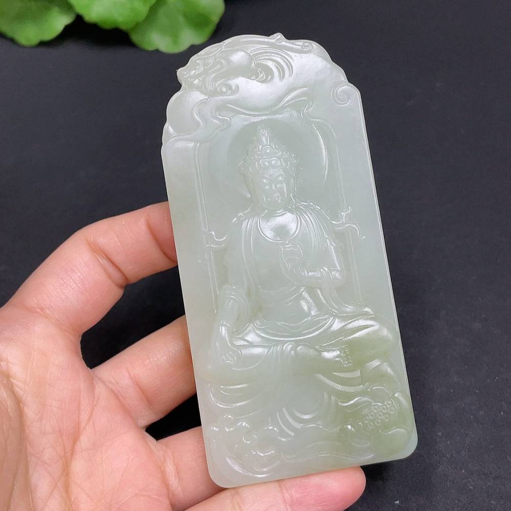 Huiliu certified Hetian jade pendant featuring Guanyin figure, smooth polished surface, intricate carved details, and natural jade color.