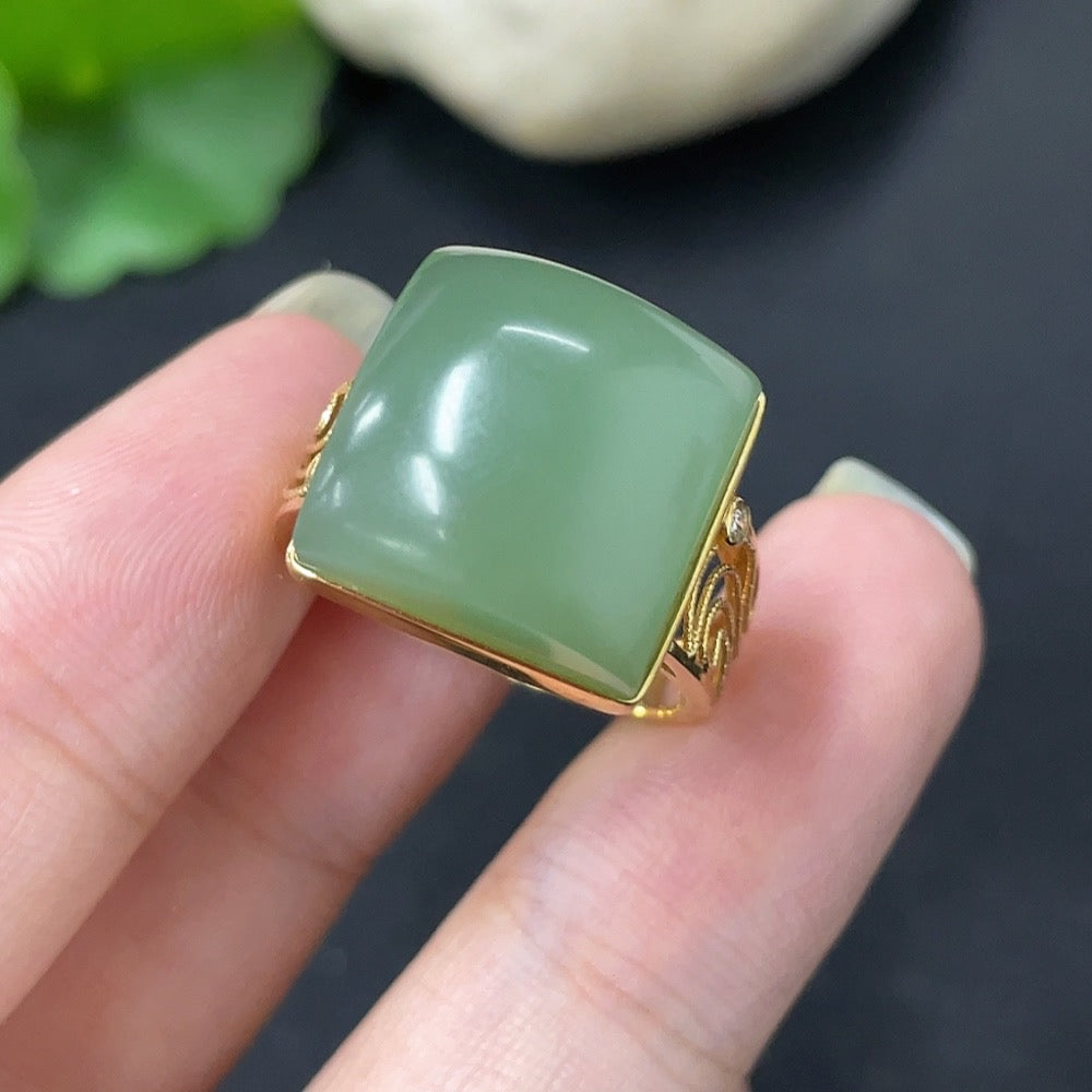 18K gold Hetian jade ring with diamond accents, elegant jewelry piece by HKHQ featuring intricate inlay design.
