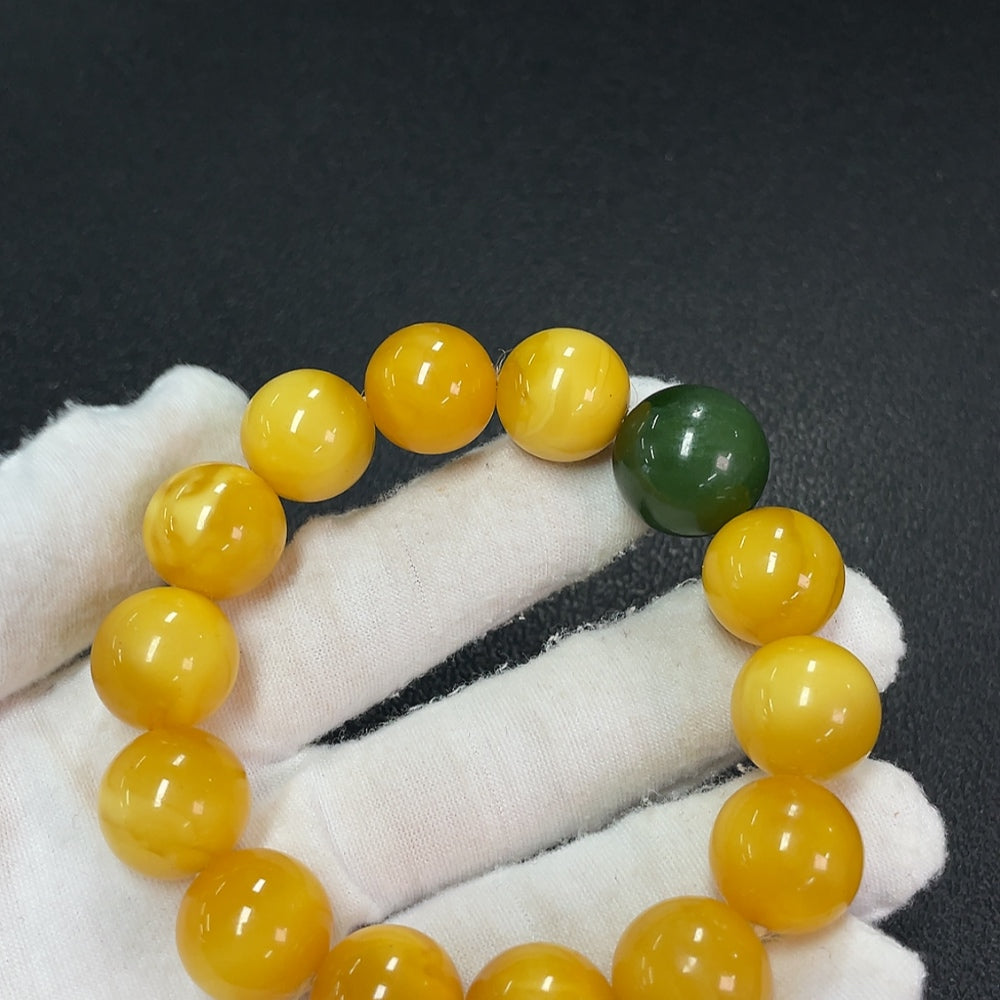 Amber beeswax bracelet with Hetian jade beads, partial repair, about 15mm, crafted by HUILIU HQ, natural jewelry piece