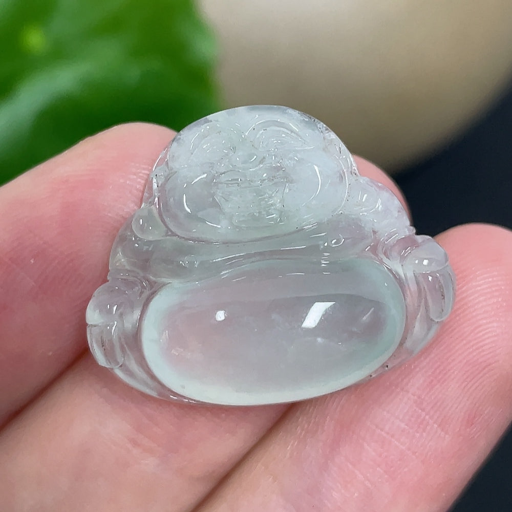 Jadeite pendant featuring a Buddha design, weighing approximately 4.10 grams, crafted by HKHQ in smooth, polished jade.