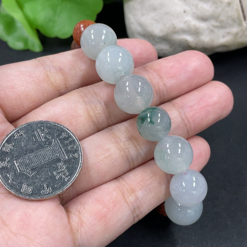Jadeite and wood bead bracelet with 12.2mm beads, HKHQ brand, showing close-up of natural green jade and wooden accents.