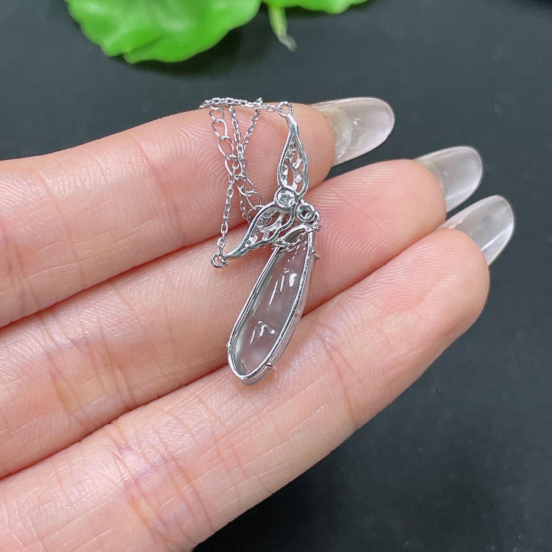 HUILIU HQ jadeite bean pendant in 18k gold set with diamond, showing the pendant and chain on a white background.