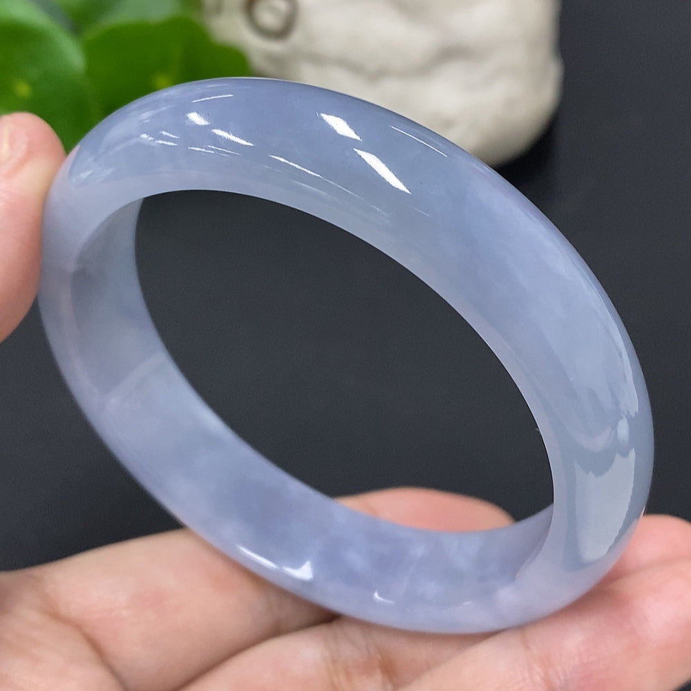 HUILIU HQ Jadeite round bangle with size 57.3 and weight 56.3g, featuring smooth, polished jade surface and circular design.