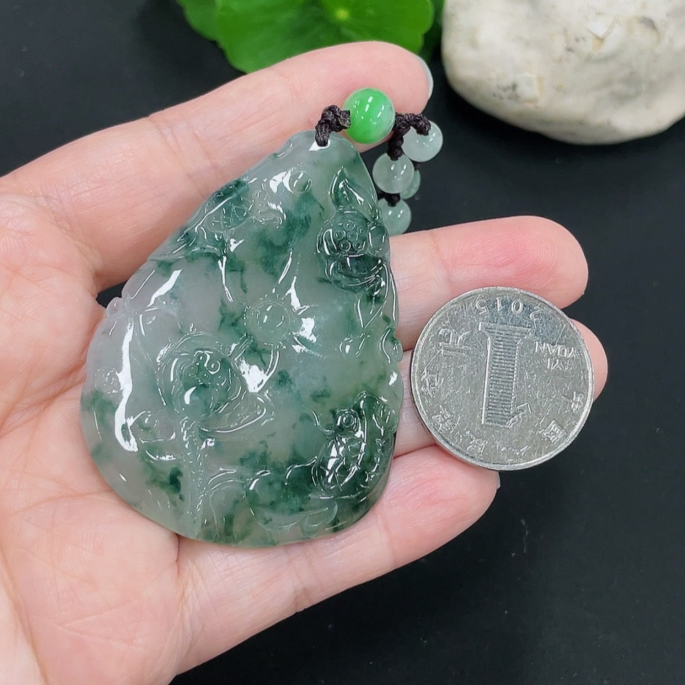 Huiliu Jadeite Auspicious Yearly Abundance Pendant featuring intricate carvings in vibrant green jade.