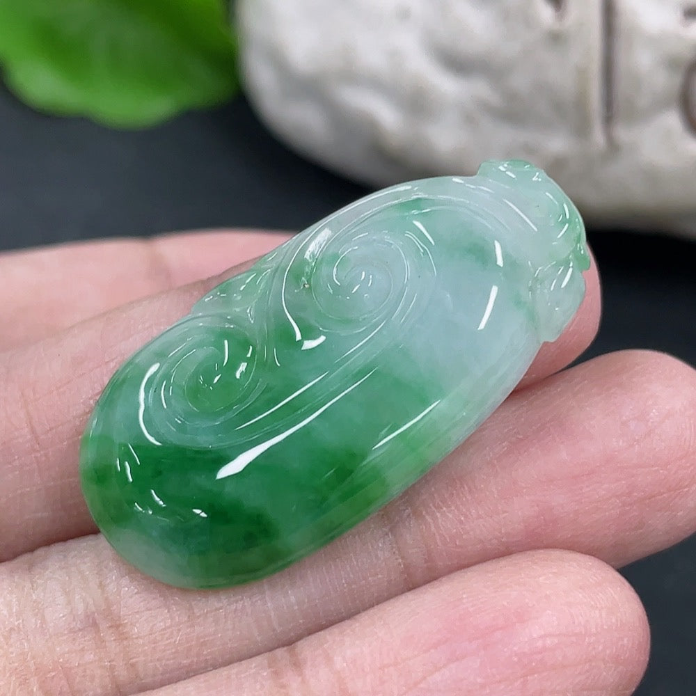 Elegant jadeite Ruyi pendant necklace from HKHQ featuring a smooth, polished green jadeite pendant with traditional Chinese design.