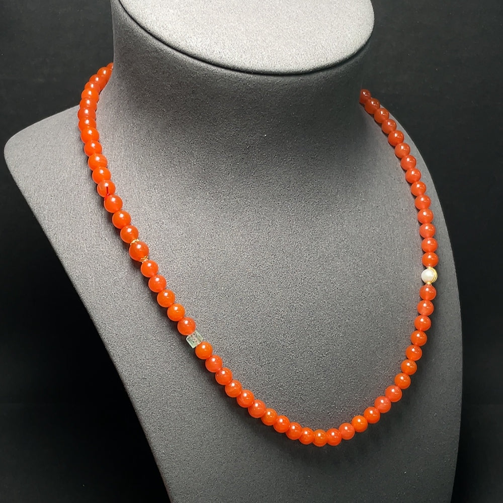 Red agate bead strand necklace with 18K gold accents, featuring tourmaline and pearl details by HKHQ.