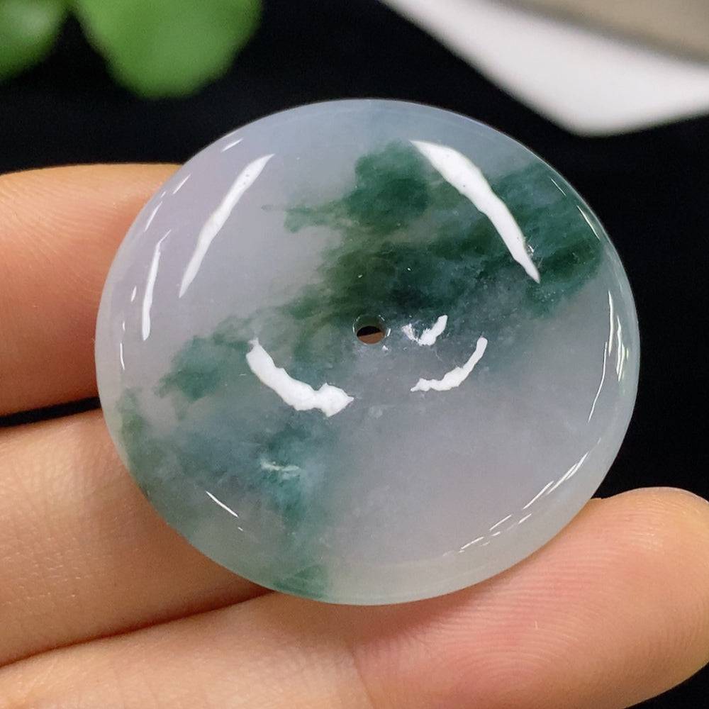 Huiliu Jadeite Peace Knot pendant featuring a polished green jade jadeite with intricate knot design, certified by Huiliu HQ.