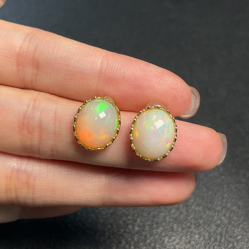 Huiliu certified gemstone opal earrings with 37% content, featuring vibrant, polished opal stones in elegant jewelry setting