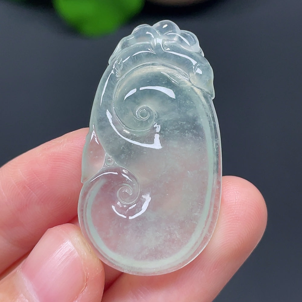 Jadeite Ruyi pendant from HKHQ, intricately carved jade jewelry with a smooth, polished finish, weighing approximately 7.36 grams.