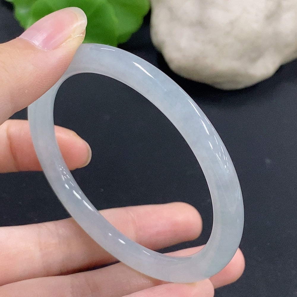 Jadeite round bangle with size 55.7 and weight 23.89g, showcasing smooth, polished jadeite jade bracelet from HKHQ.