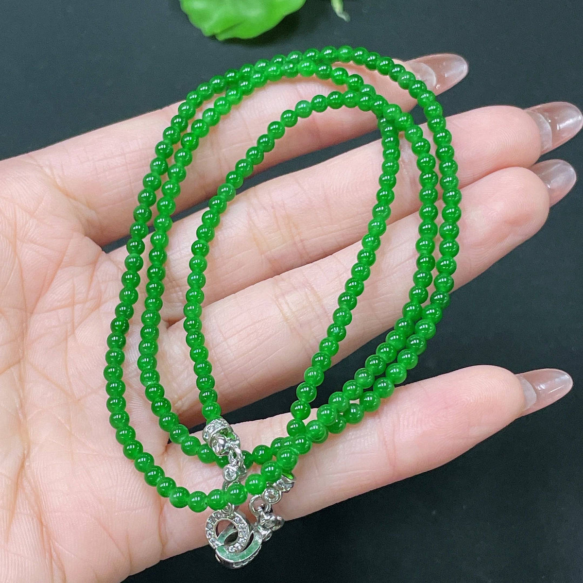 Jadeite bead necklace by HUILIU HQ with 3.1mm jade beads, non-gold, total weight approximately 11.4g, close-up of beads and necklace detail