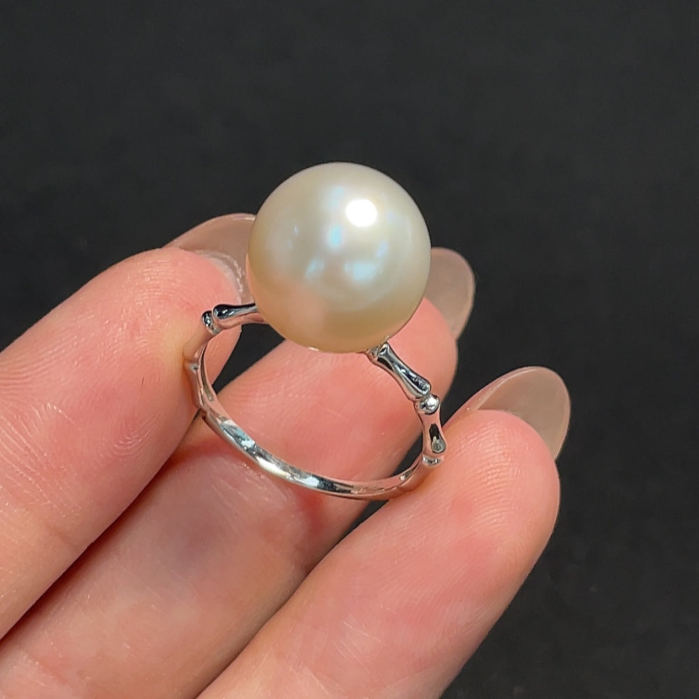 Seawater pearl ring by HKHQ featuring 13mm pearl, 18K gold band, size 16.5, with a total weight of 4.69g.