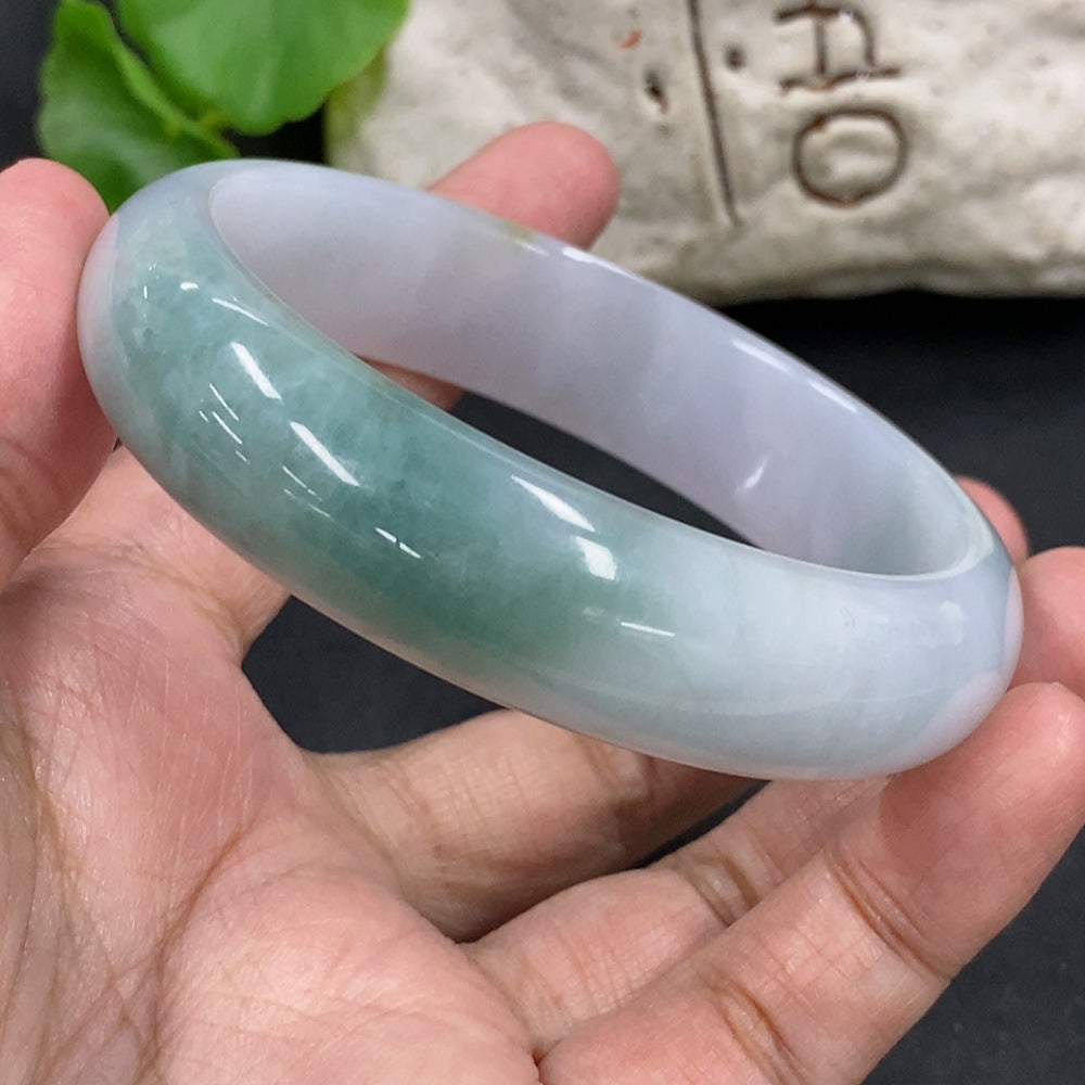 Jadeite round bracelet with smooth, polished jade beads, weight 64.3g, size 59.4mm, from HKHQ showing close-up of beads.