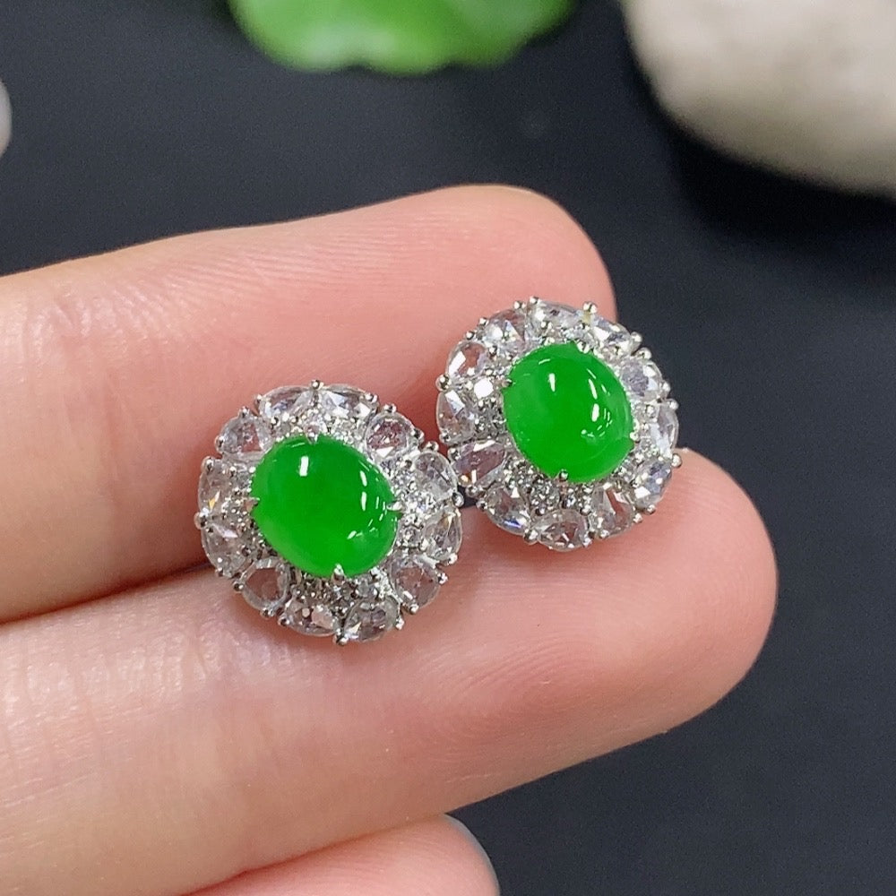 HKHQ Jadeite earrings with 18k gold and diamond accents, featuring smooth green jade stones and elegant gold detailing.