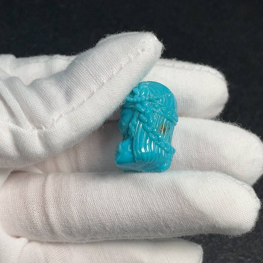 HUILIU HQ turquoise gemstone pendant, approximately 9.03g, showcasing vibrant blue-green color and natural stone details.