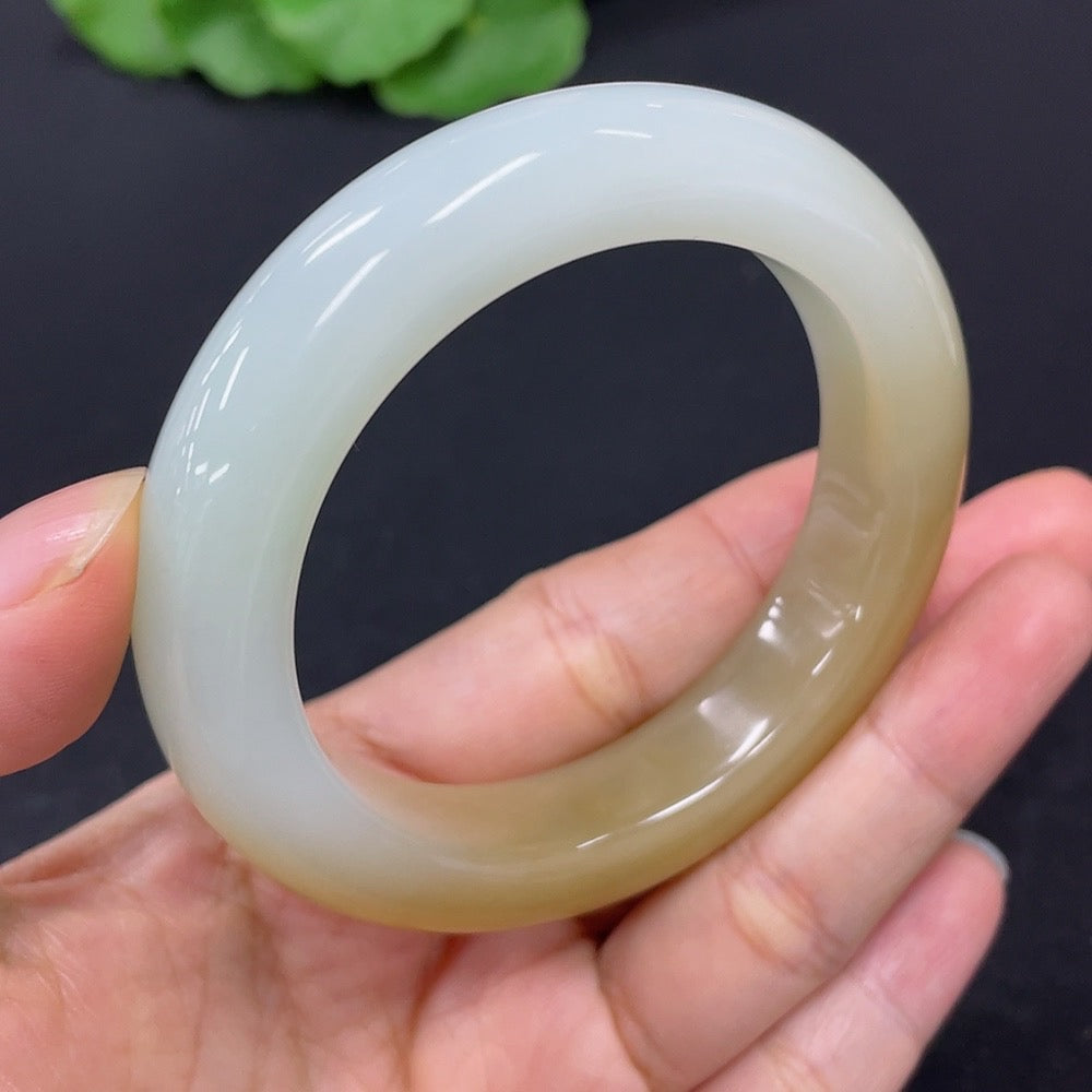 HKHQ Hetian Jade round bangle, size 51.3, weighing 60.1g, showcasing smooth, polished jade bracelet with natural green hue.