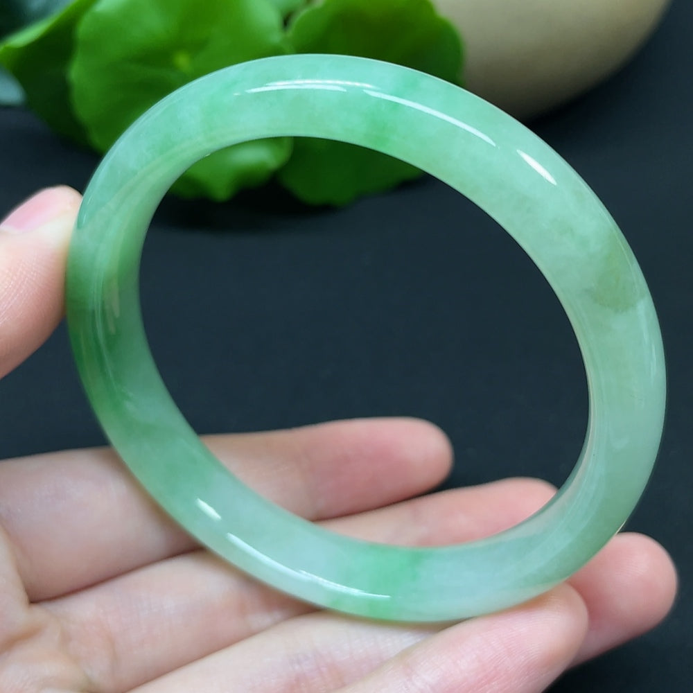 HKHQ jadeite round bangle, size 54.7, 37.95g, featuring smooth, polished jadeite with a glossy finish.
